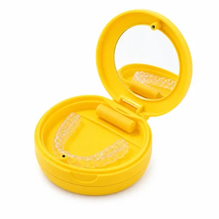 Yellow double layer retainer case with built-in mirror and clear aligner on a white background.