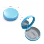 Round mirror retainer case with clear aligners inside, portable storage case for retainers, mouth guards, and dental appliances.